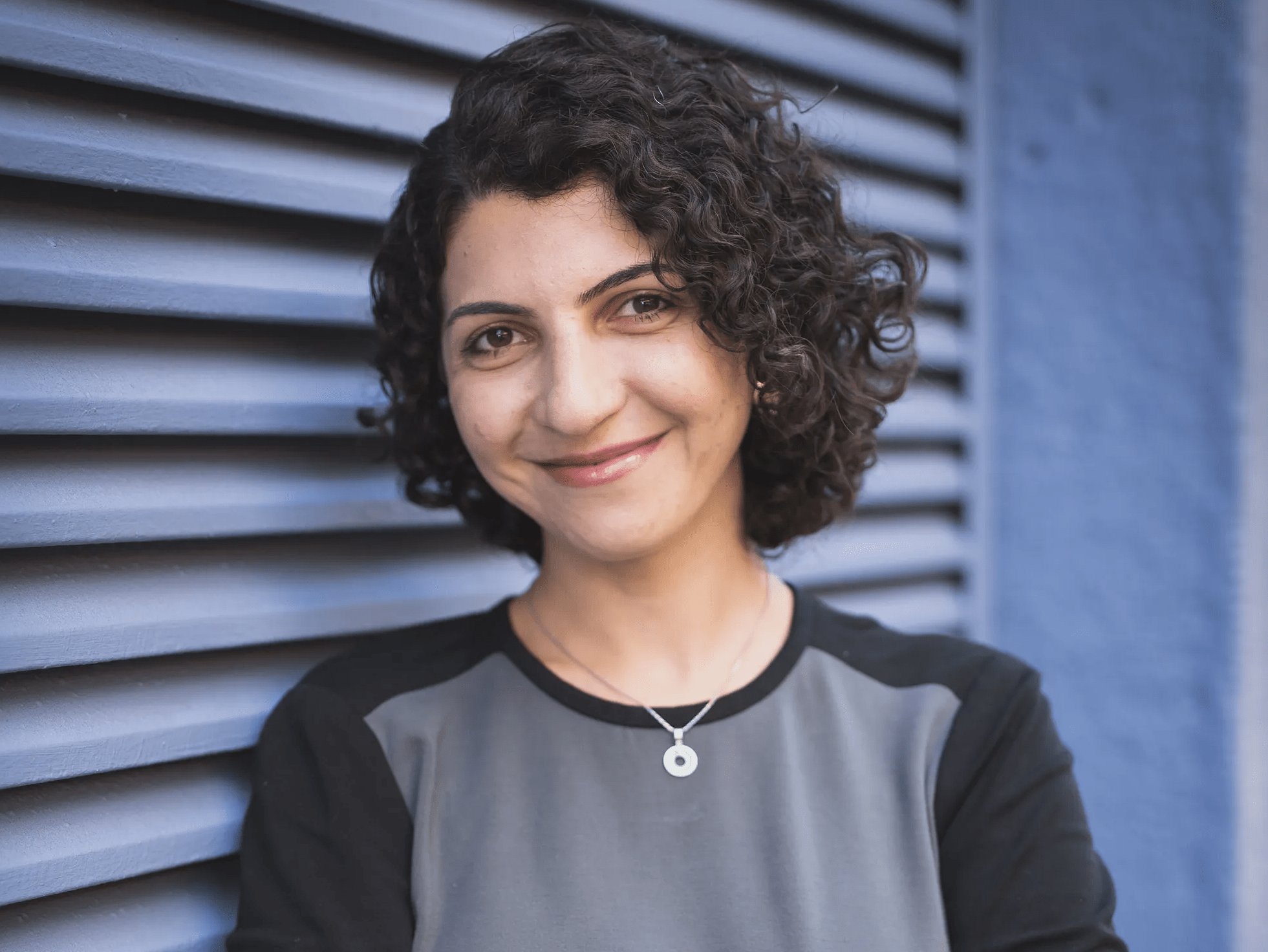 farnaz-ronaghi-headshot-with-background